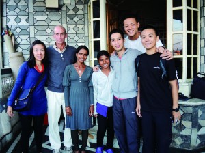 Jay Wong Ka-wai (third from right) with his teammates, the director (second from left) and staff of Nepal Orphans Home