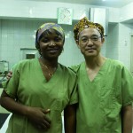 Au with a colleague at Teme Hospita, where he worked with MSF.