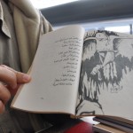 Sayed Gouda showing his poem “Dumb Birds”
