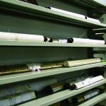 Scrolls of old maps and historical documents 