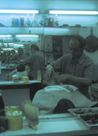 Shanghaiese barbers at work