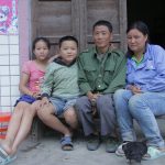 Miner Zhao Pinfeng (second right) with his family, as featured in the documentary, Miners, the Horsekeeper and Pneumoconiosis (Photo courtesy of Jiang Nengjie)